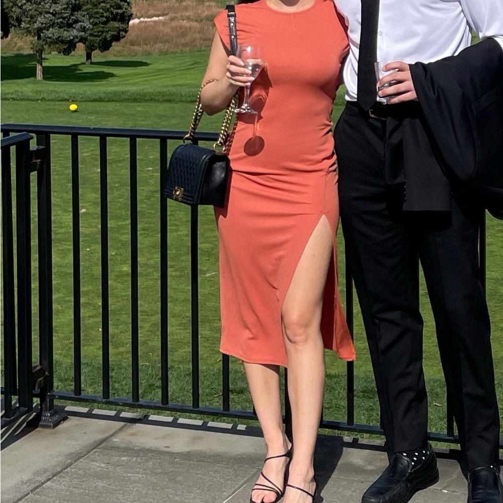 NBD dress with slit and open back.